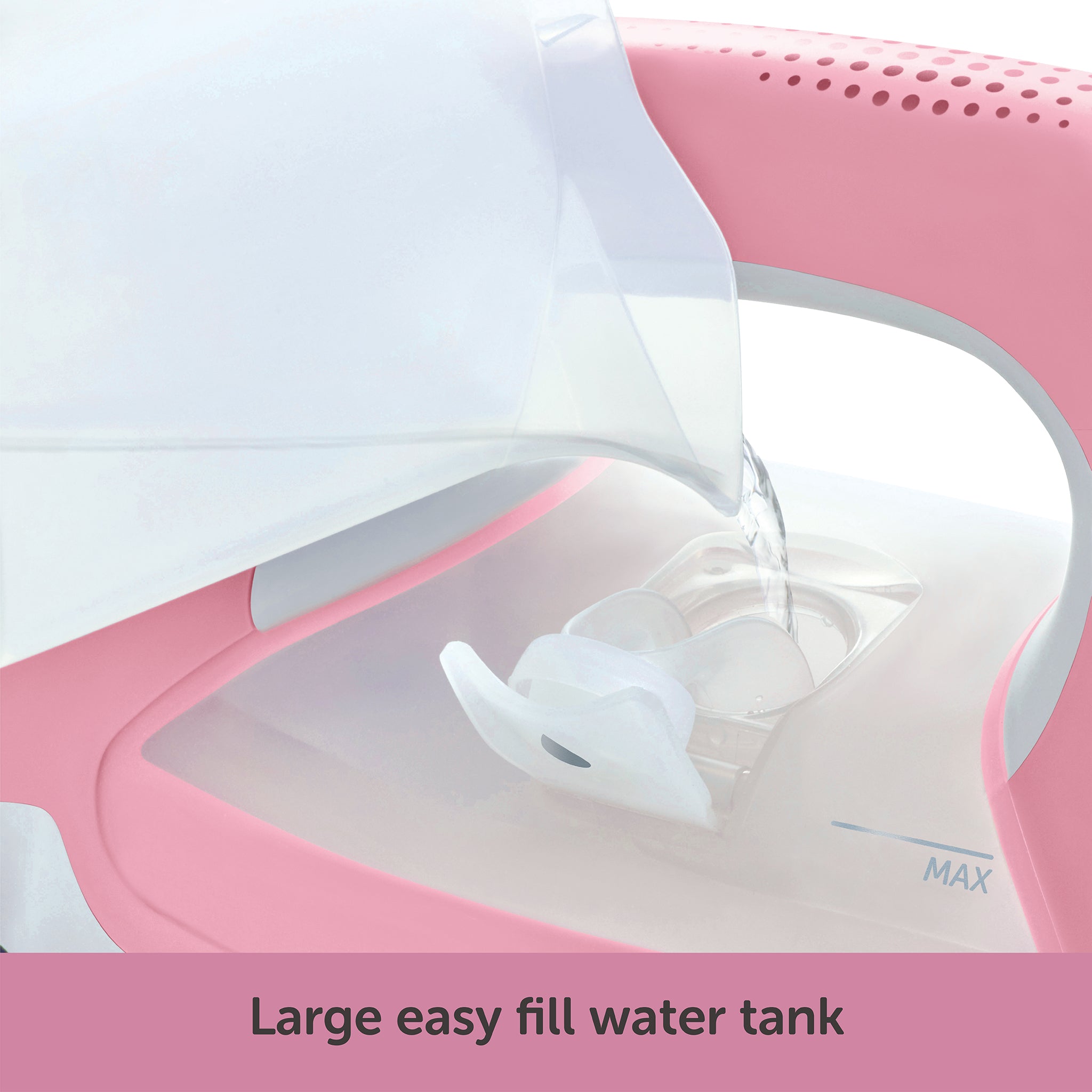 The filler cup pouring water into the large 12.7 once water tank through the convenient side filling door.