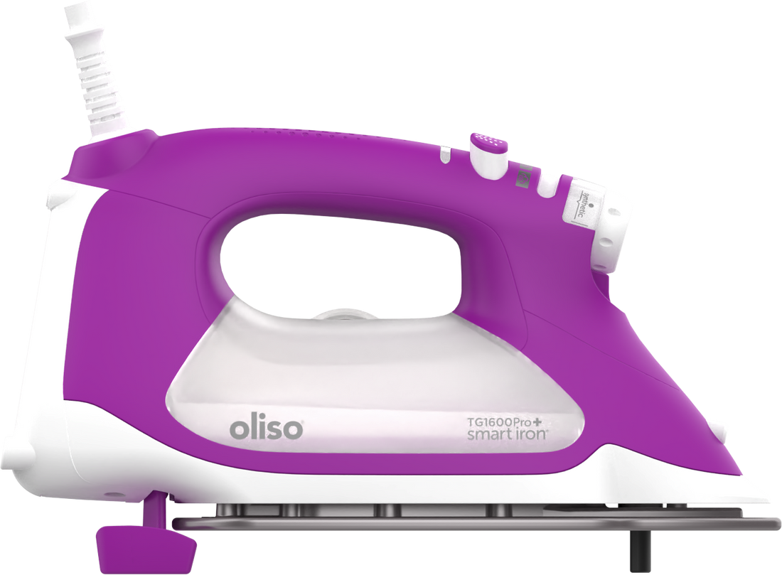Oliso ProPlus purple  Smart iron  with its auto-lift legs extended, raising it above  fabric and ironing surfaces.