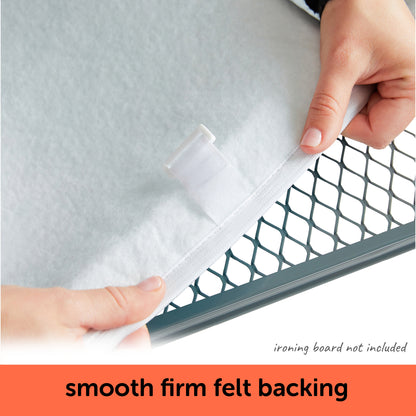 Person showing the smooth firm felt backing of an oliso ironing board cover. With text indicating that the an ironing board is not included with the cover.