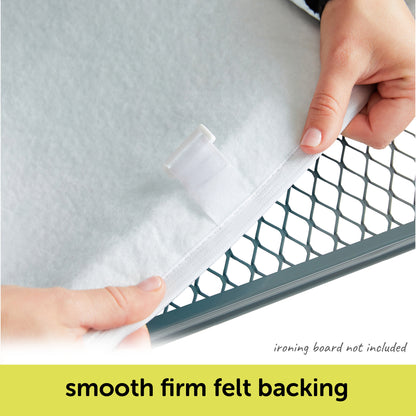 Person showing the smooth, firm felt backing of an oliso ironing board cover. With text indicating that an ironing board is not included with the cover.