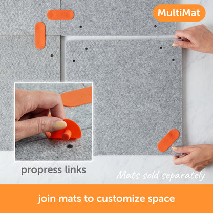 Content description =&quot;Four Oliso MultiMat wool pressing mats joined using ProPress silicone links to form a customizable workspace. User&