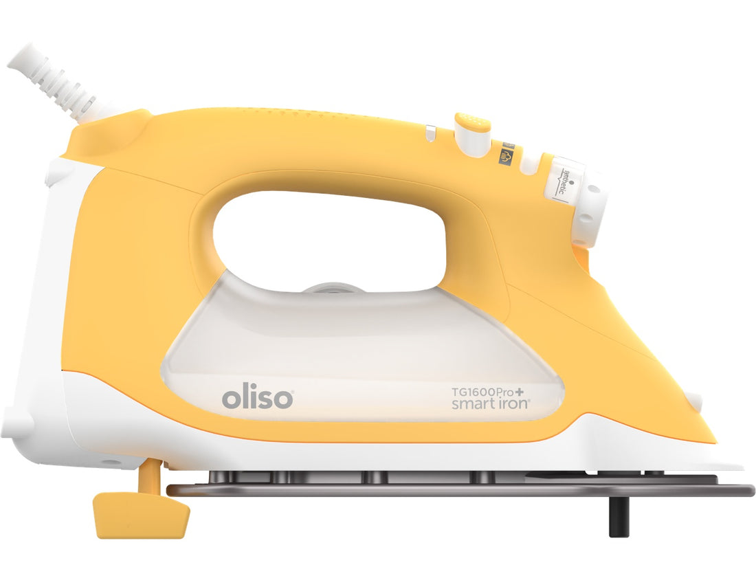 Yellow ProPlus Smart Iron raised on it legs .