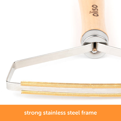 Close-up of Oliso MultiMat cleaning tool showing durable stainless steel frame and dual metal comb for wool mat fiber removal.