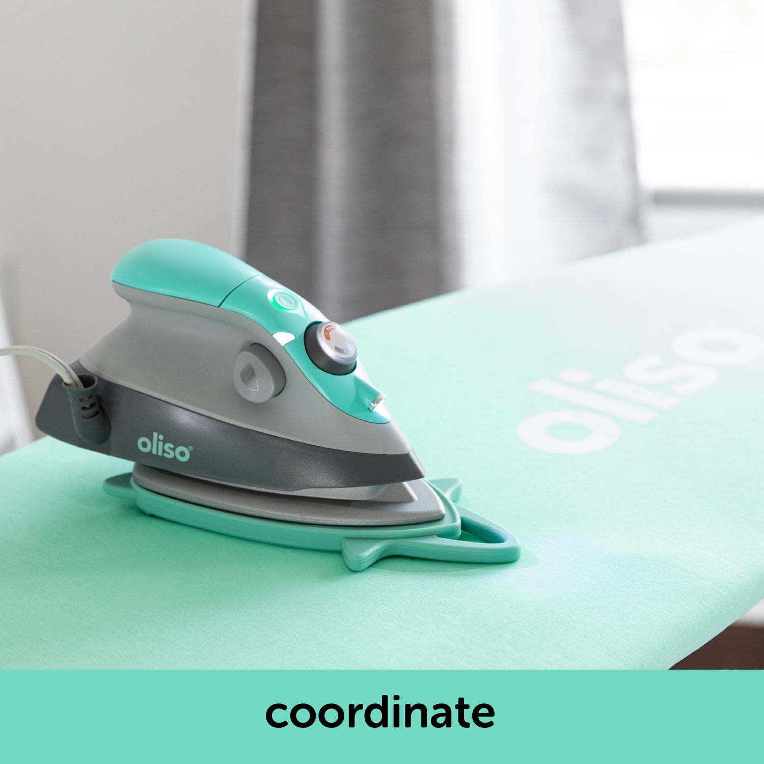 Image showing how the aqua oliso M3Pro project iron coordinates with the aqua ironing board cover. Each is sold separately.