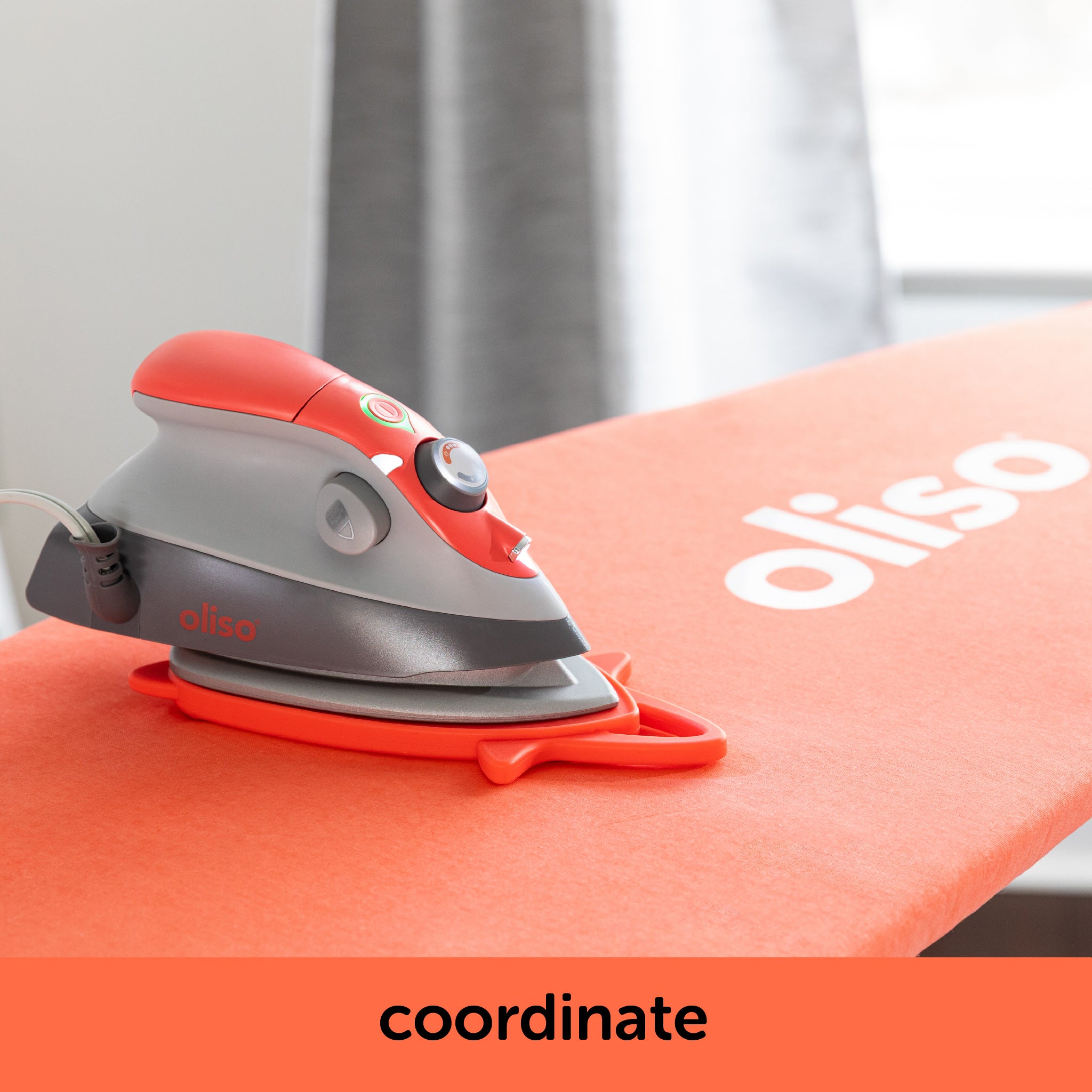 Image showing how the coral oliso M3Pro project iron contrast with the coral ironing board cover. Each is sold separately.