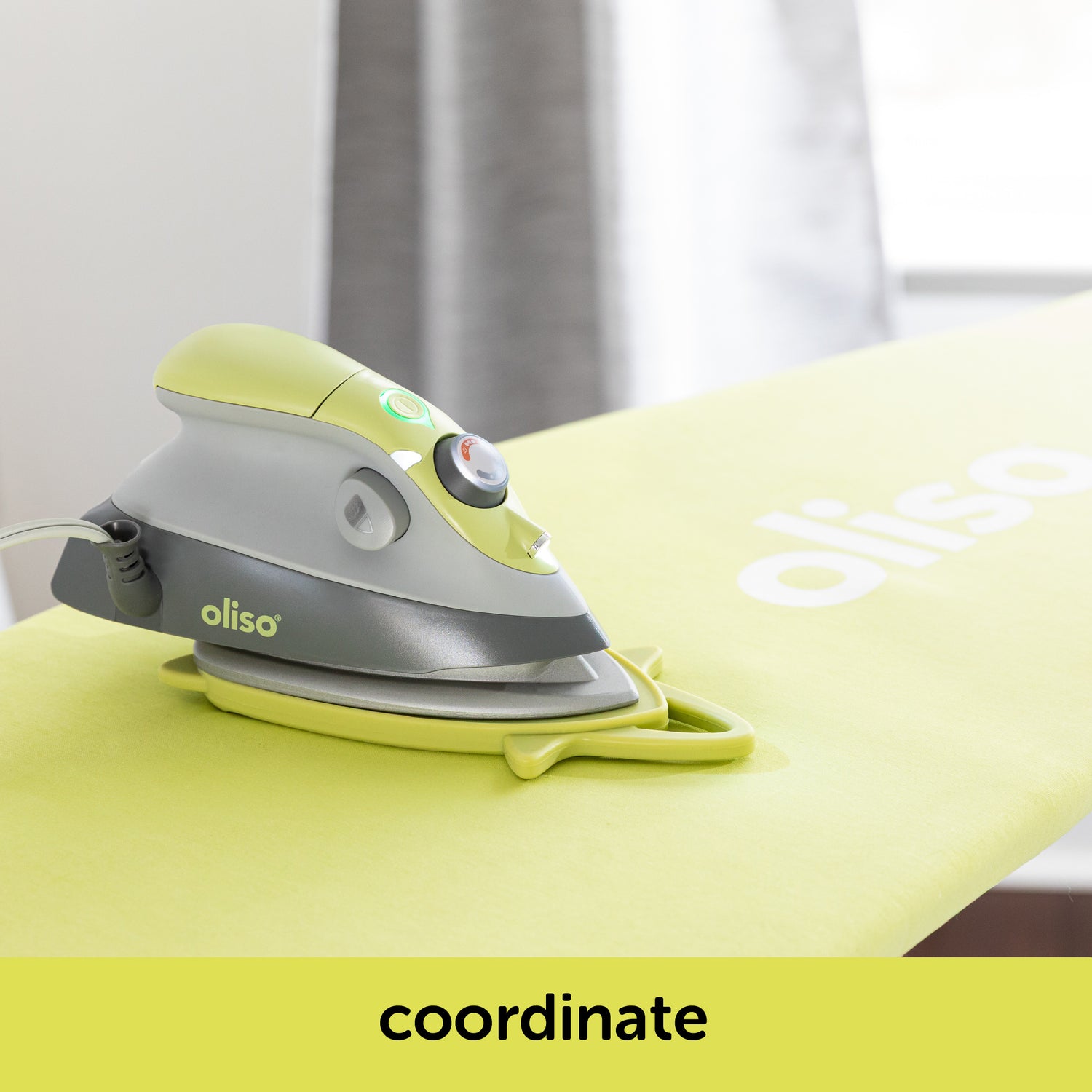 Image showing how the pistachio oliso M3Pro project iron coordinates with the pistachio ironing board cover. Each is sold separately.