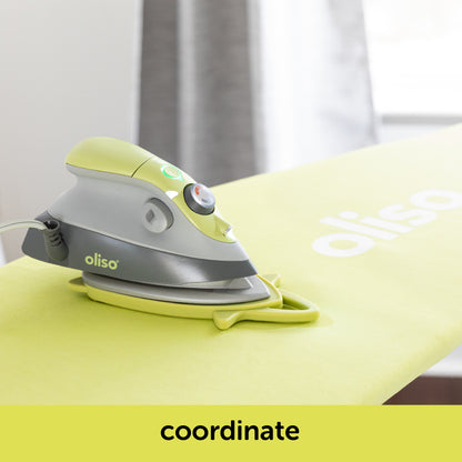 Image showing how the pistachio oliso M3Pro project iron coordinates with the pistachio ironing board cover. Each is sold separately.