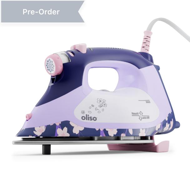 Oliso M3Pro auto-lift smart iron in midnight blue with cherry blossom design by Yaya Han, full-size iron for safer, effortless pressing, ideal for sewing, quilting, and making cosplay costumes