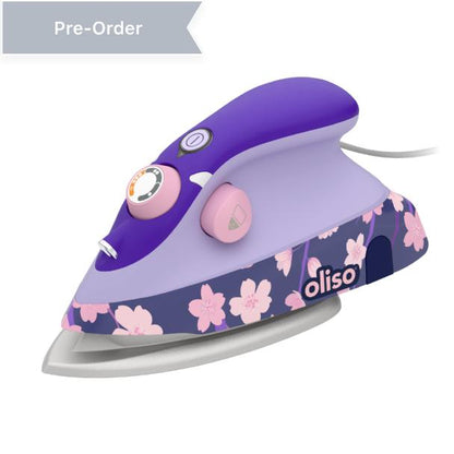 Oliso Yaya Han M3Pro project iron in Midnight Orchid with cherry blossom design, compact travel steam iron with LED light, auto-off, ceramic soleplate,  and precision tip. For sewing, quilting, and cosplay costume making.