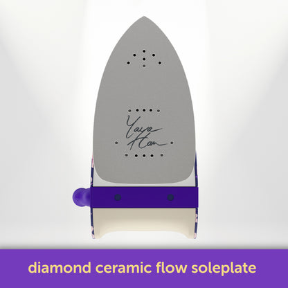 Oliso Yaya Han M3Pro project iron in Midnight Orchid with cherry blossom design, featuring a durable, easy-to-clean ceramic soleplate and 100 watts of power for fast, precise heating—ideal for sewing, quilting, and cosplay costume making.