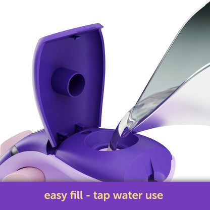 Oliso Yaya Han M3Pro project iron in Midnight Orchid with cherry blossom design - easy-to-fill top water tank; uses tap water for convenience.  For sewing, quilting, and cosplay costume making.