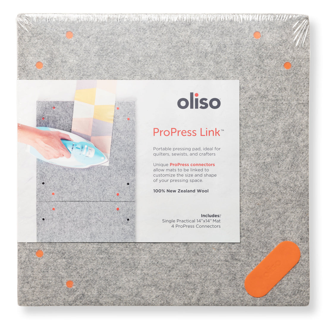 Oliso MultiMat in its packaging: 100% New Zealand wool mat for pressing and ironing