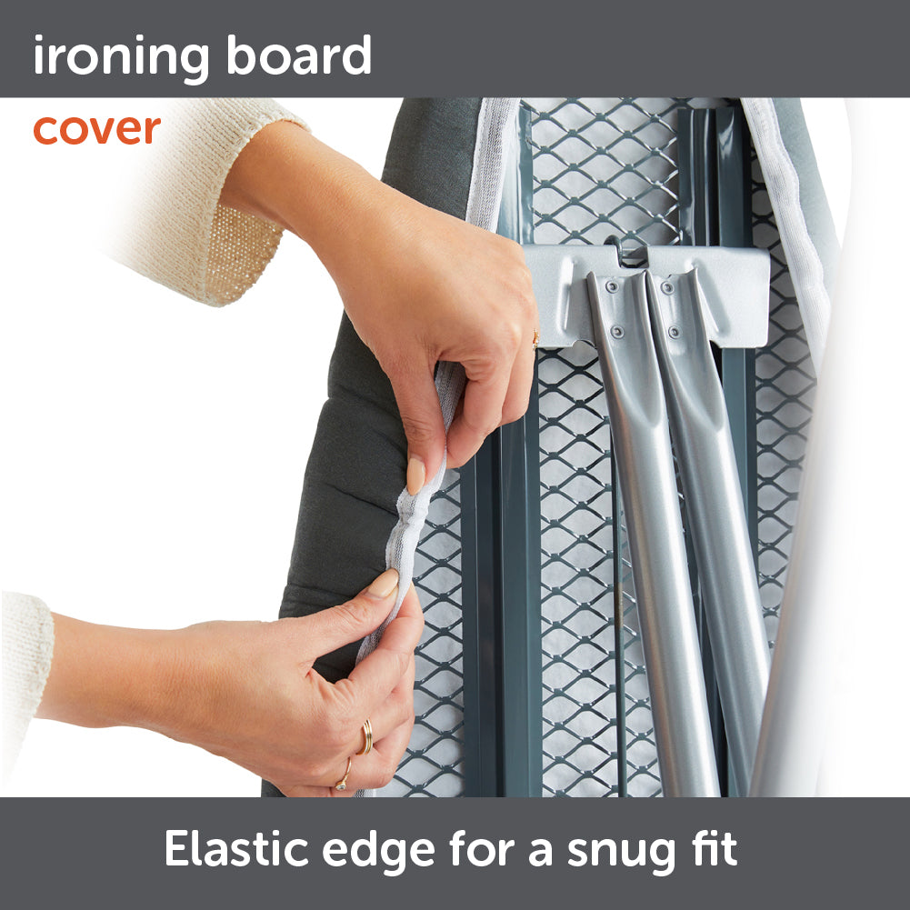 Hands stretching the elastic edge that helps the Oliso ironing board cover fit snugly on a standard ironing board.