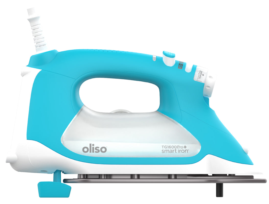 Turquoise ProPlus Smart Iron raised on it legs .