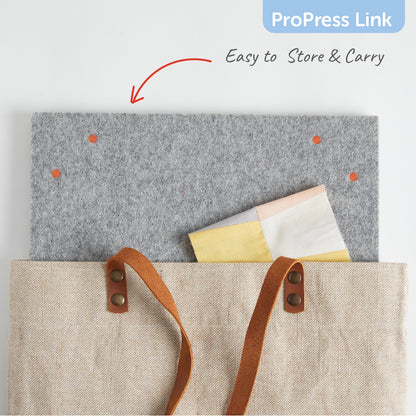 The 14 x 14 inch felt mat being placed in a bag for easy transport and storage.