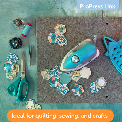 Oliso M2Pro mini project iron pressing a paper piecing project on  ProPress  felt mat